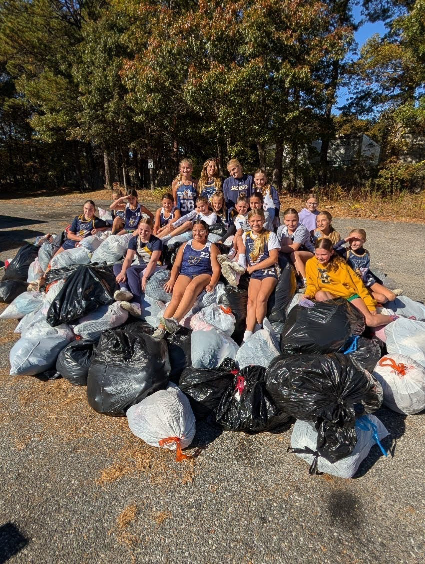 High school athletes collecting clothing donations for their team fundraiser