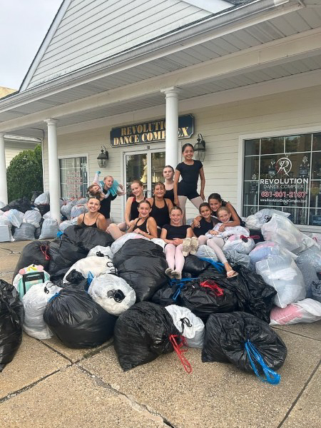 Go Green team collecting donations for environmental and community causes