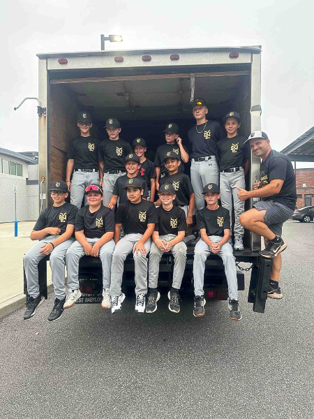 Go Green staff assisting community members at drop-off site