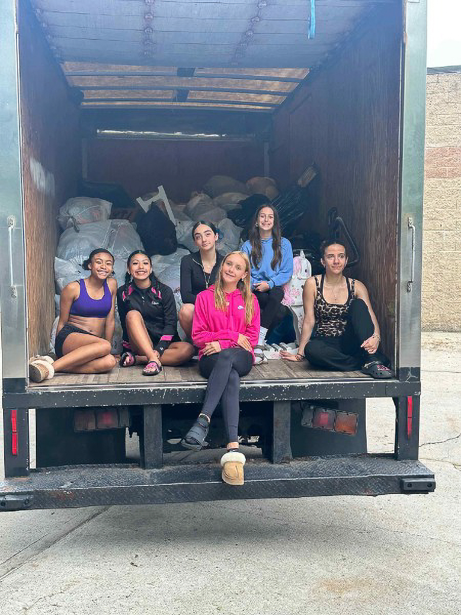 Successful Go Green Clothing Drive fundraiser event benefiting a local sports team